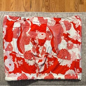 The Peanut Shell Sling Carrier Red White Floral